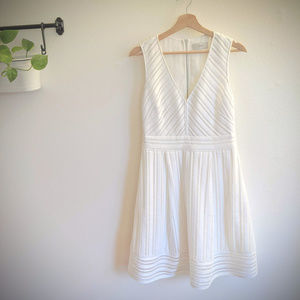 White fit and flare deep V neck dress